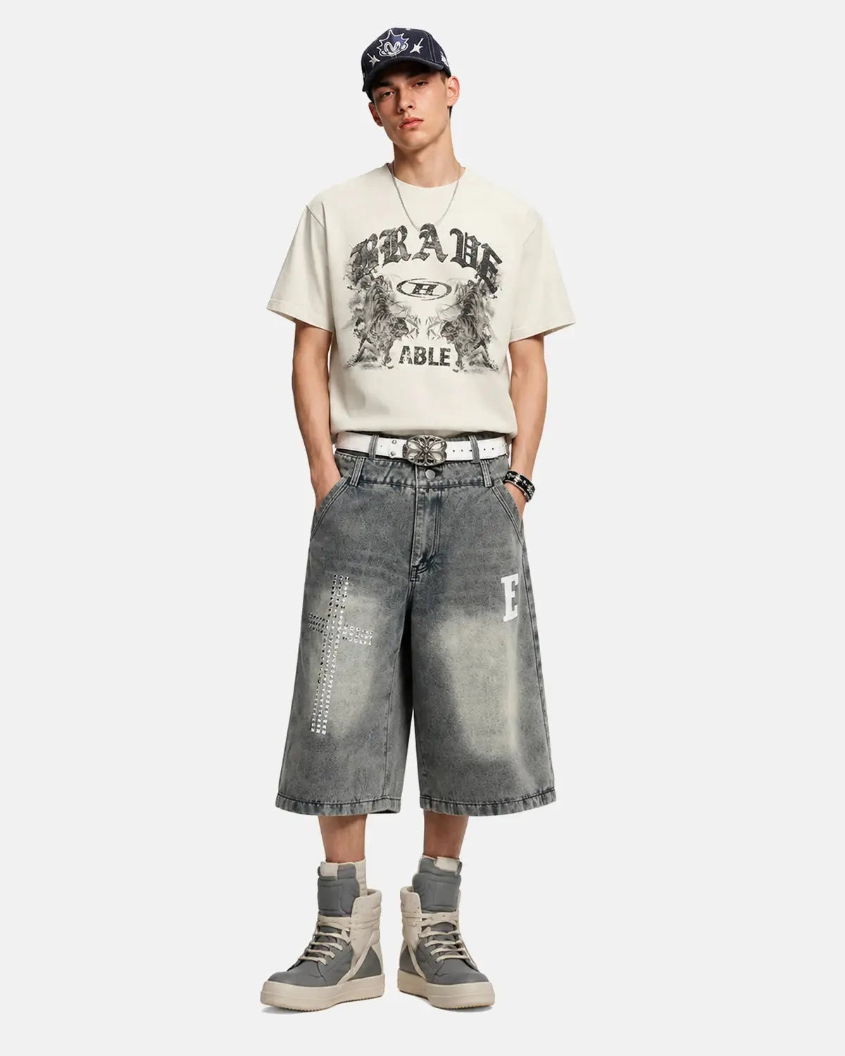 Graphic washed vintage oversized T-shirt by INFLATION, featuring distressed streetwear style and bold graphic print.
