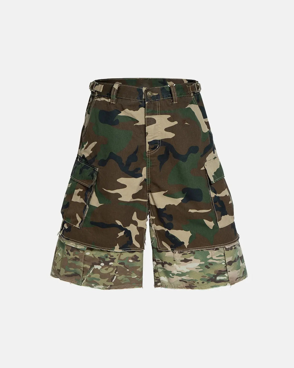 Camo layered longline jorts by INFLATION, featuring a relaxed fit with camouflage pattern and extended hem for a streetwear look.