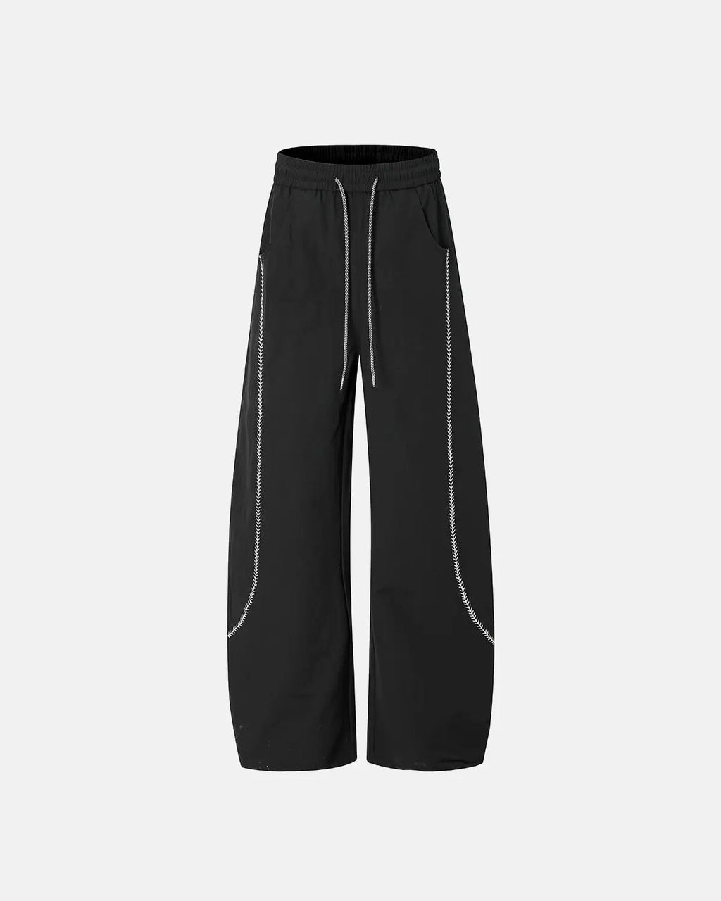 INFLATION AirFlow Contrast Embroidered Track Pants showing black fabric with colorful embroidered details and tapered fit.