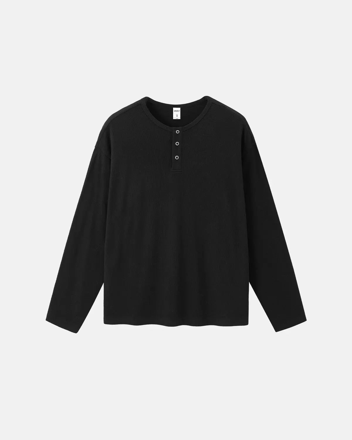 Inflation brand Henley collar long sleeve T-shirt in neutral color, featuring a buttoned neckline and casual streetwear style.