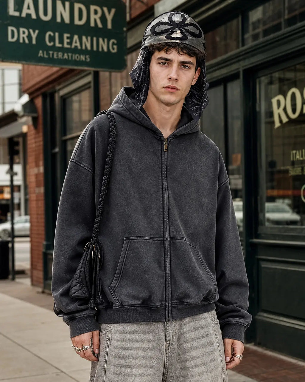 Vintage washed Flation zip-up hoodie with a relaxed fit and soft fabric, displayed on a hanger.