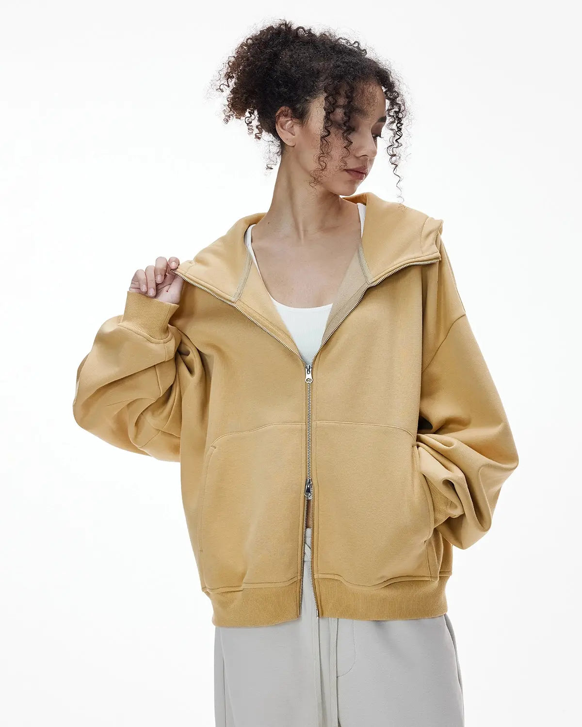 Inflation Streetwear high collar fleece double zip-up hoodie with adjustable hood and front pockets, in dark color.