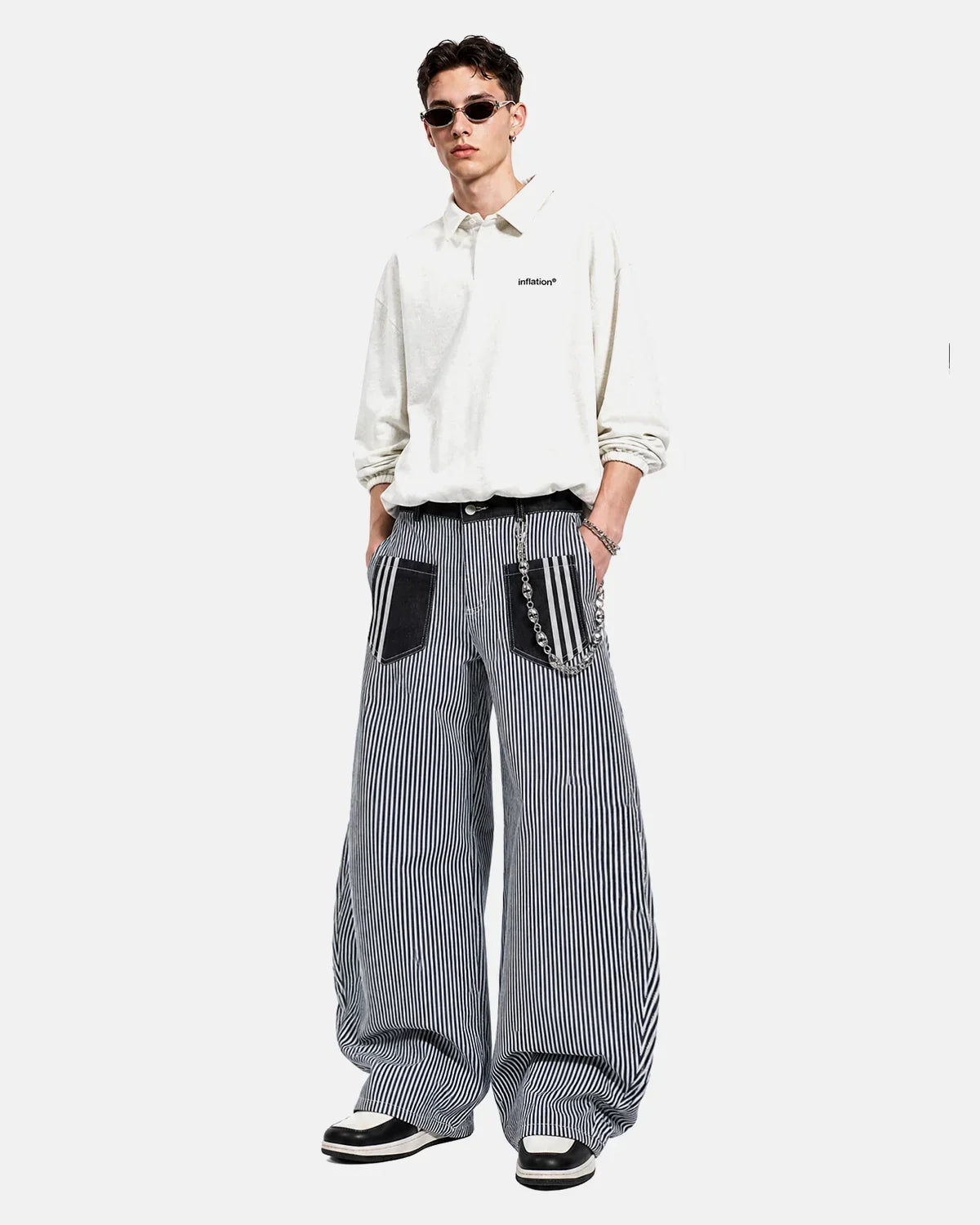 Inflation Streetwear striped patch pocket baggy jeans with relaxed fit, featuring bold stripe pattern and patch pockets, casual style.
