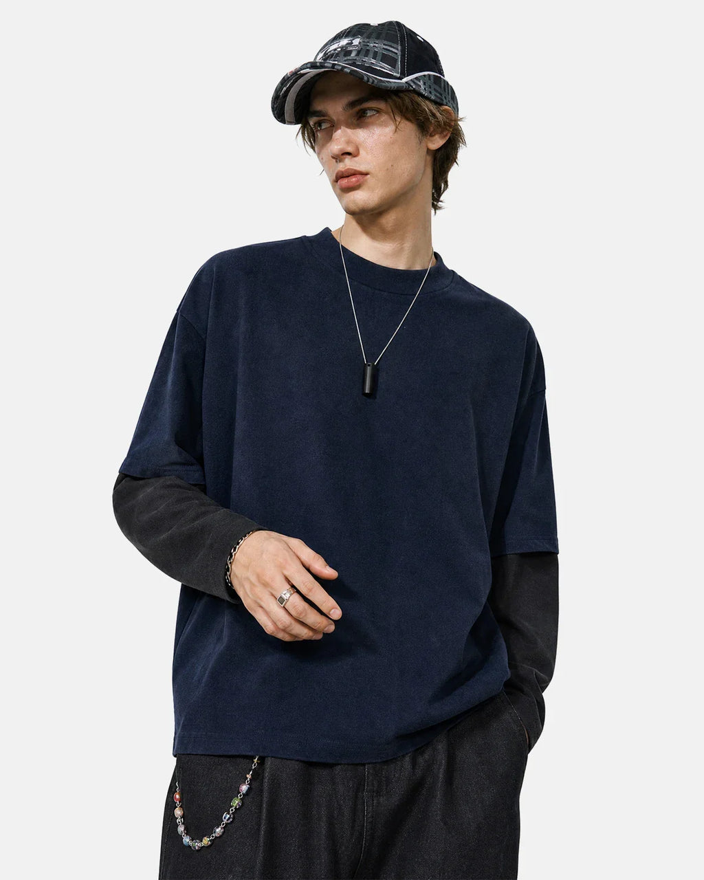 Color block long sleeve tee by Flation Streetwear featuring vibrant color blocks and a casual fit, shown on a model.