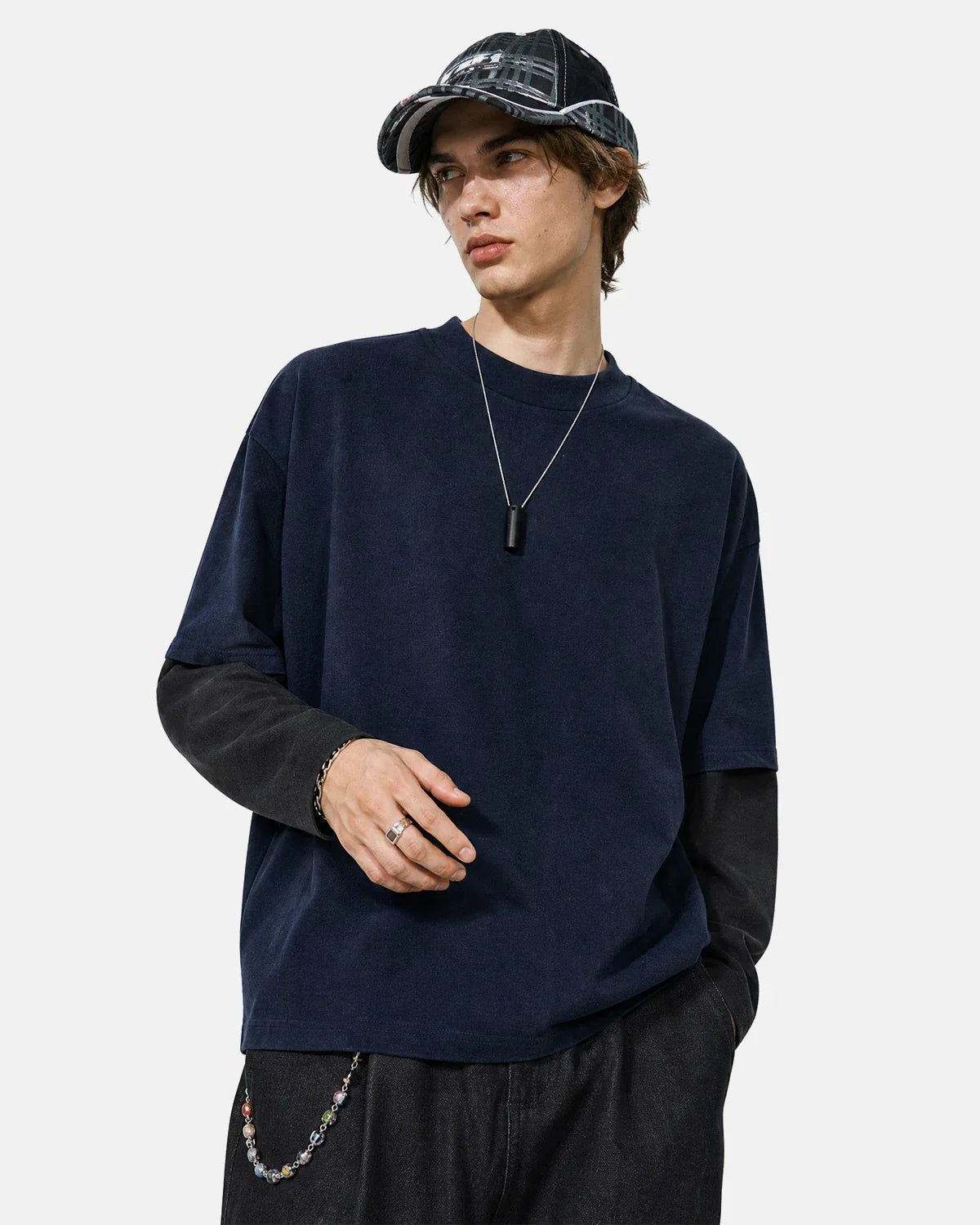 Color block long sleeve tee by Flation Streetwear featuring vibrant color blocks and a casual fit, shown on a model.