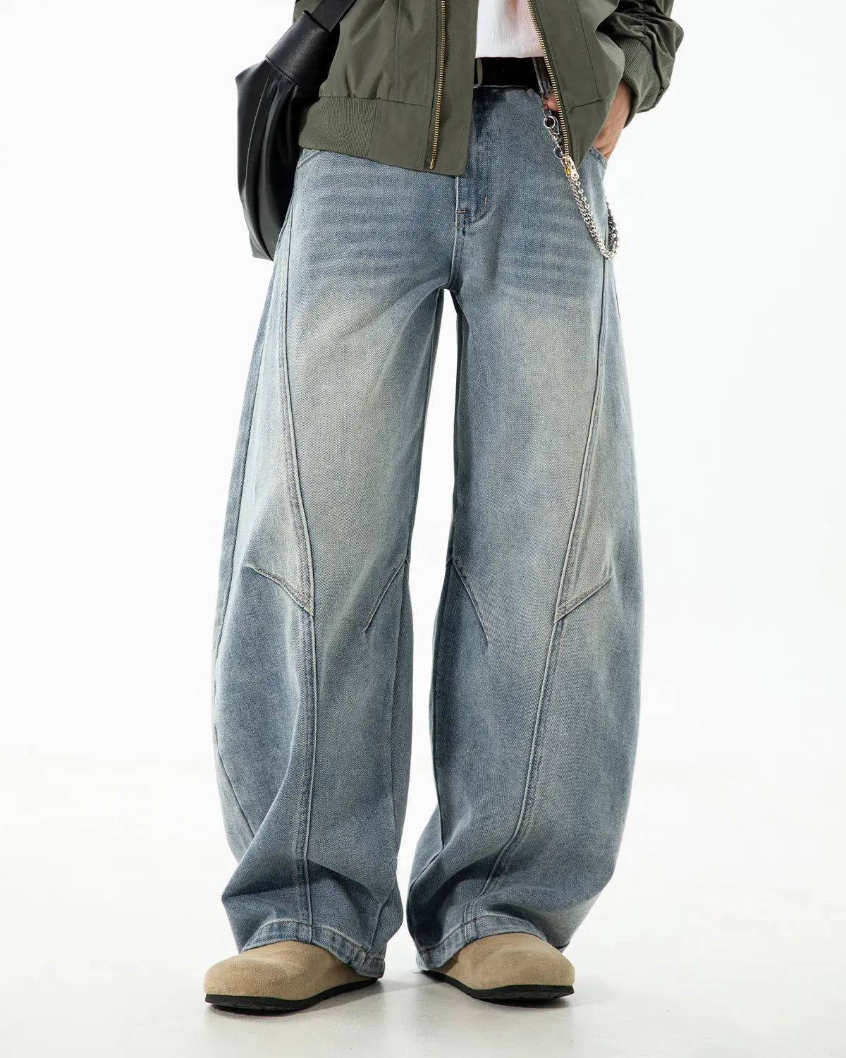 Curved seam deconstructed barrel jeans by INFLATION Streetwear, showcasing fitted design with unique seam detailing.