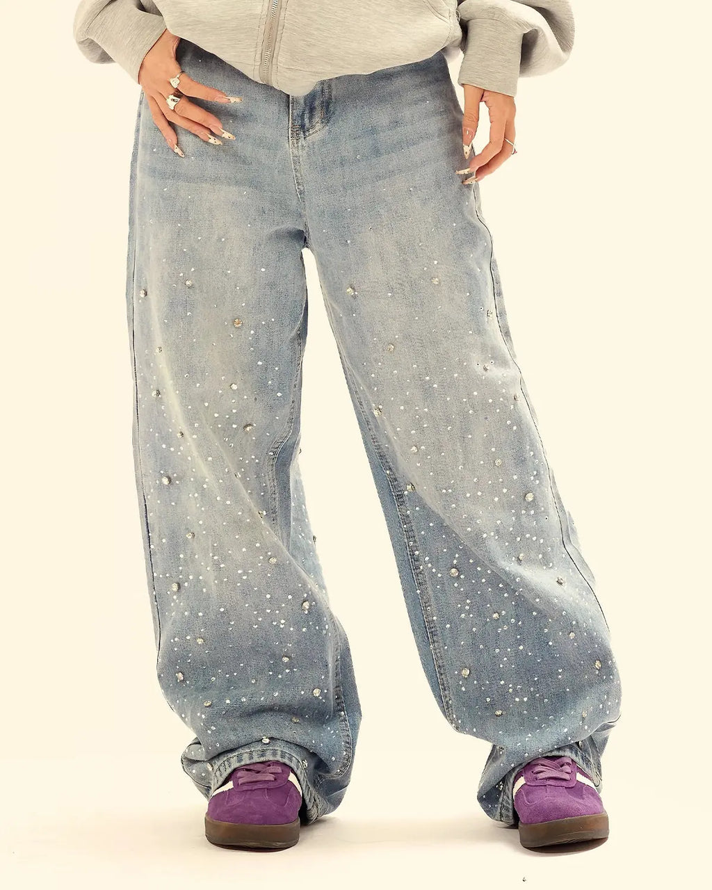 Flation studded rhinestone baggy jeans featuring embellished details, casual streetwear style with a relaxed fit and trendy design.