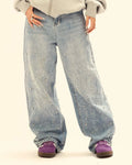 Flation studded rhinestone baggy jeans featuring embellished details, casual streetwear style with a relaxed fit and trendy design.