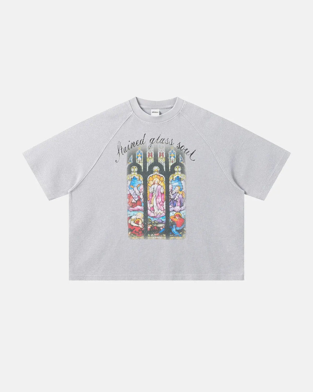 Inflation Streetwear washed graphic boxy waffle T-shirt with bold print, casual fit, and soft fabric, displayed on a hanger.