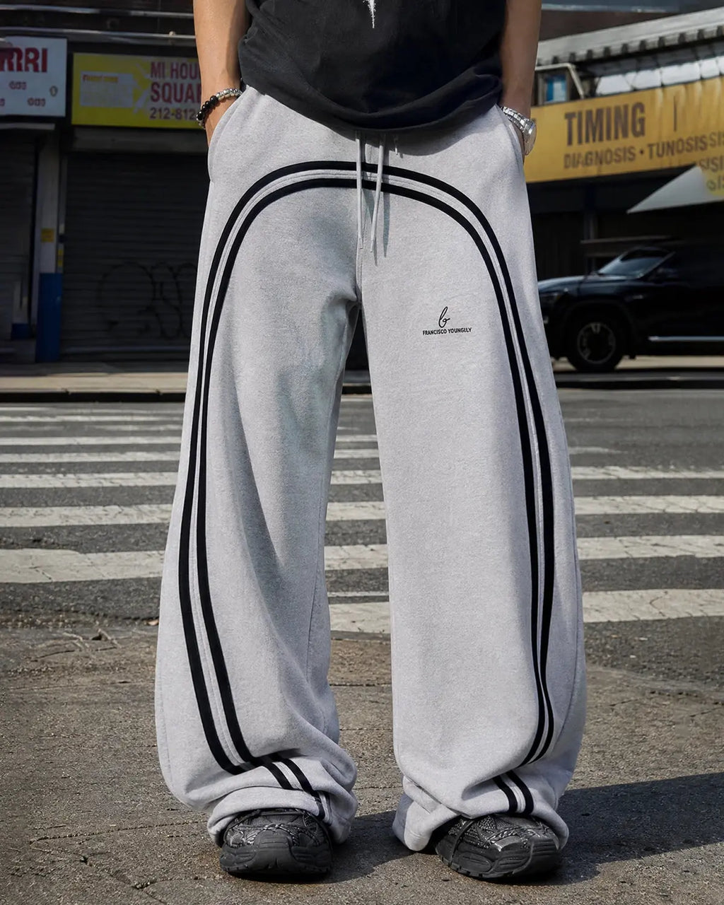 Washed wide-leg sweatpants by Flation Streetwear featuring relaxed fit and soft fabric, shown in a casual streetwear style.