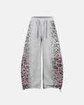 Leopard graphic barrel sweatpants by INFLATION featuring bold animal print and relaxed streetwear style.