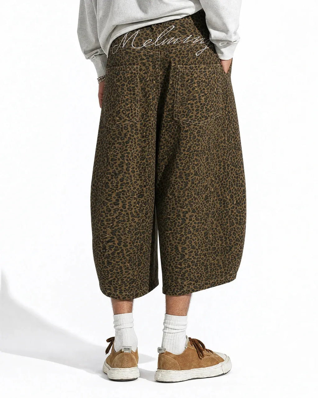 Leopard print barrel longline shorts from INFLATION Streetwear, featuring a bold animal pattern and relaxed fit.