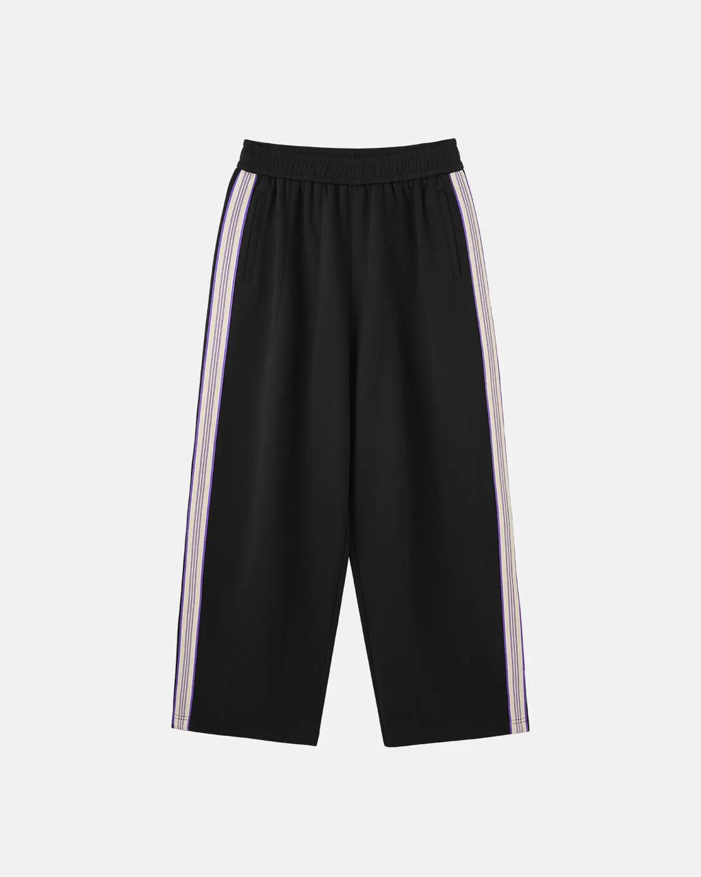 Flation athleisure wide leg baggy pants in soft fabric, relaxed fit with a stylish streetwear look, shown on a model.