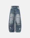 Inflation brand distressed barrel jeans with cinch back, deconstructed design, and faded denim fabric, casual streetwear pants.