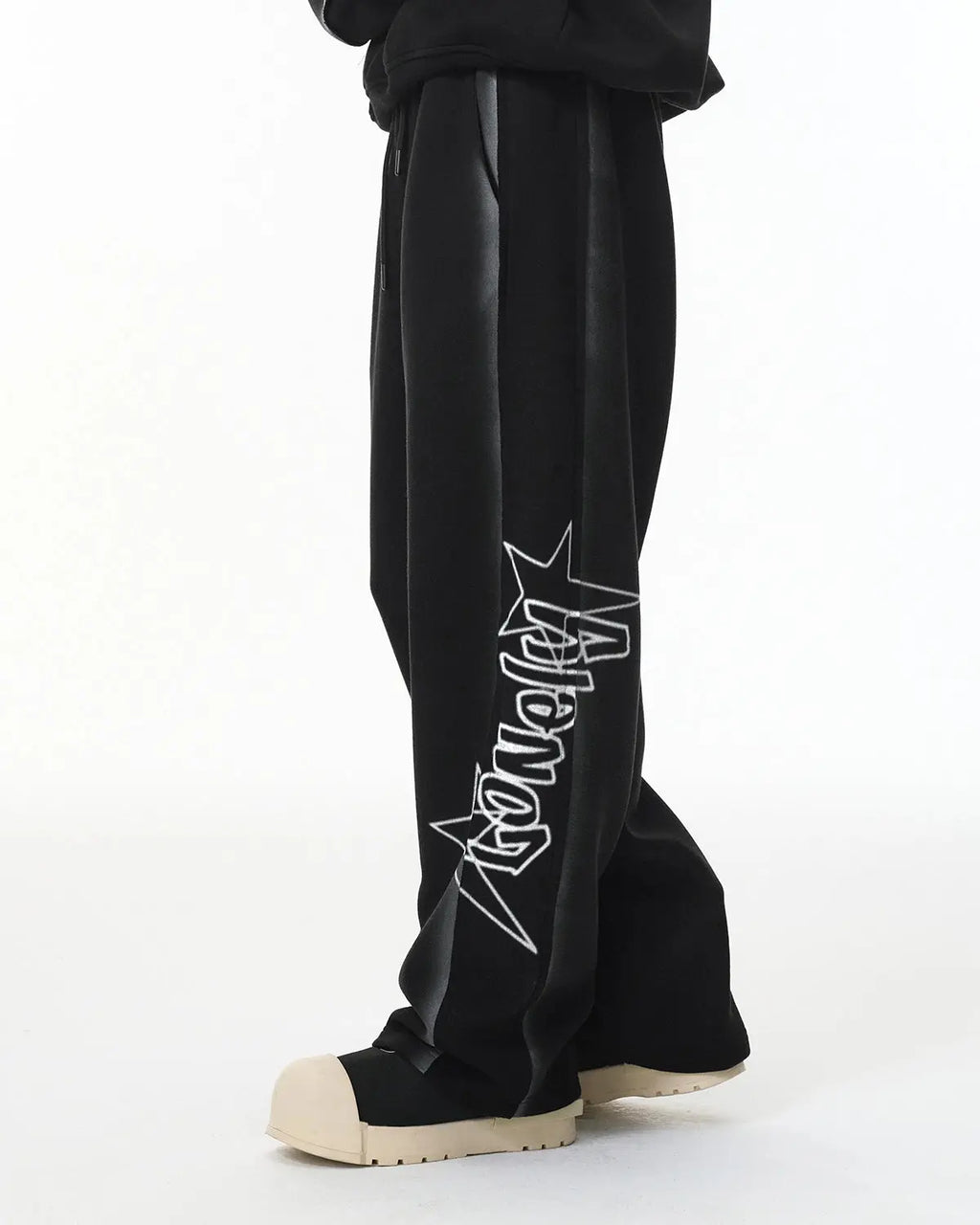 Flation Stitching Spray-Painted Graffiti Sweatpant with colorful graffiti design and relaxed fit, streetwear style.