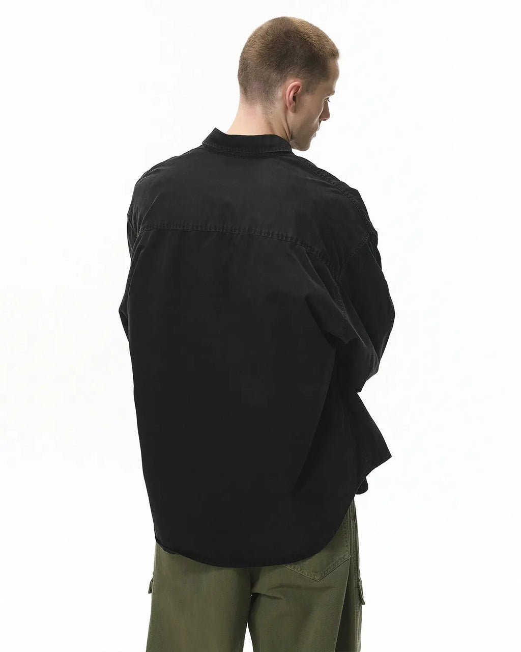 Acid wash cargo shirt jacket by Flation Streetwear, featuring rugged pockets and a distressed, vintage-inspired look.