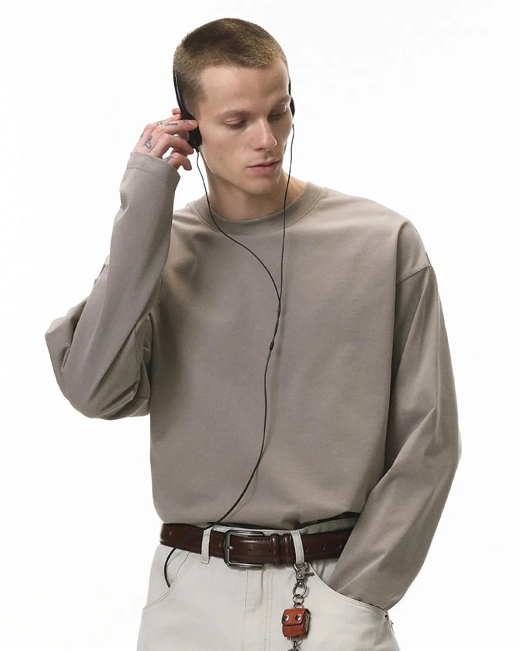 Blank cotton long sleeve T-shirt from Inflation Streetwear, white fabric with a simple crew neck and long sleeves.