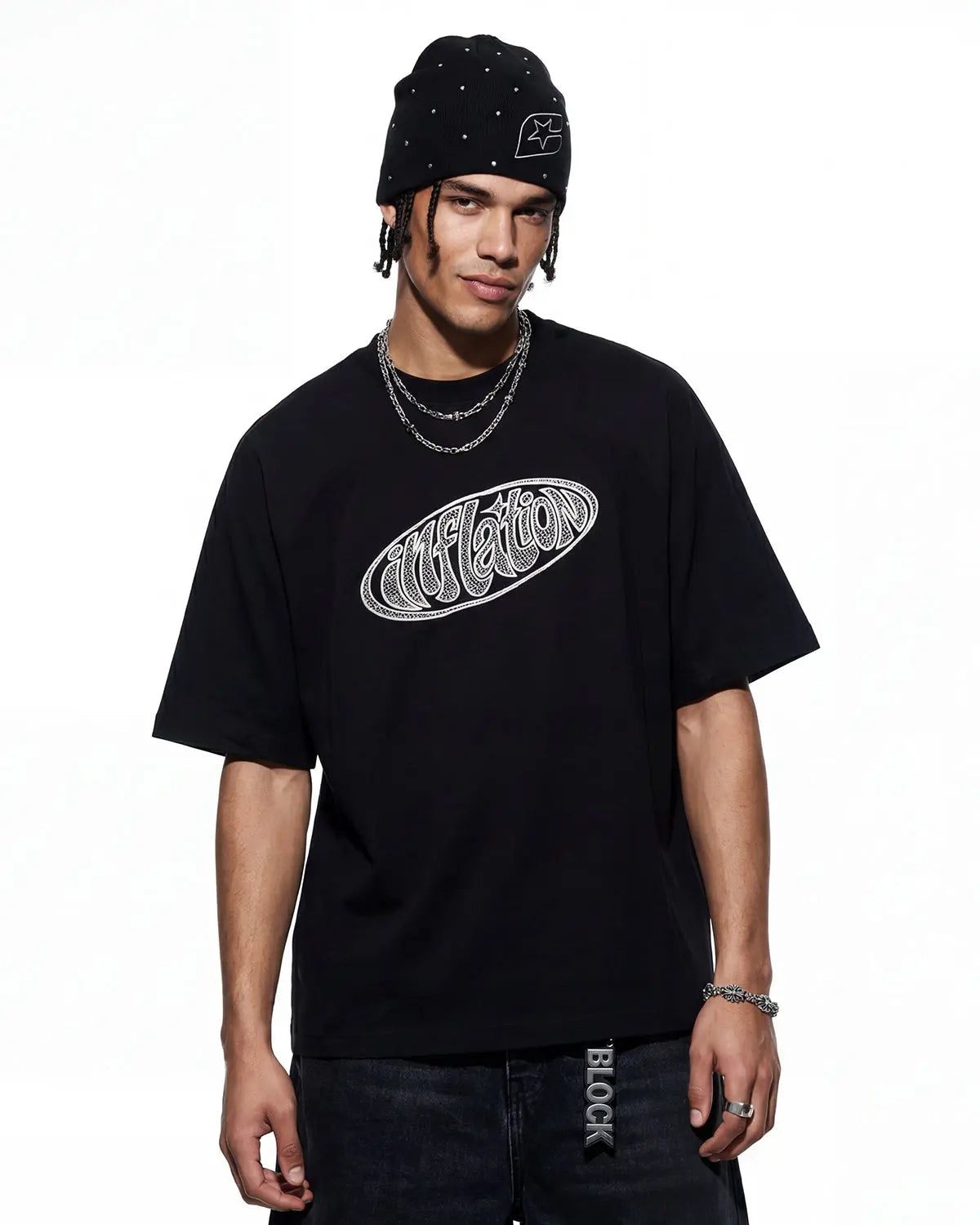 Hollow embroidered graphic T-shirt by INFLATION with intricate embroidery and bold design, casual streetwear style.