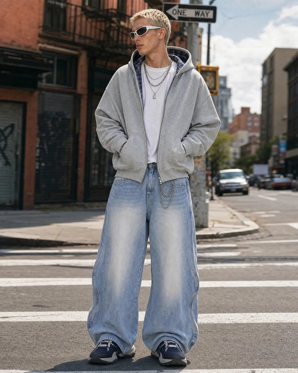 InflationUS Wave Washed Baggy Jeans, casual men's pants with a relaxed fit and washed denim finish, shown in a natural pose.