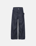 Inflation asymmetric wrap waist baggy jeans showing high-waisted, loose fit denim with unique wrap detail and distressed finish.