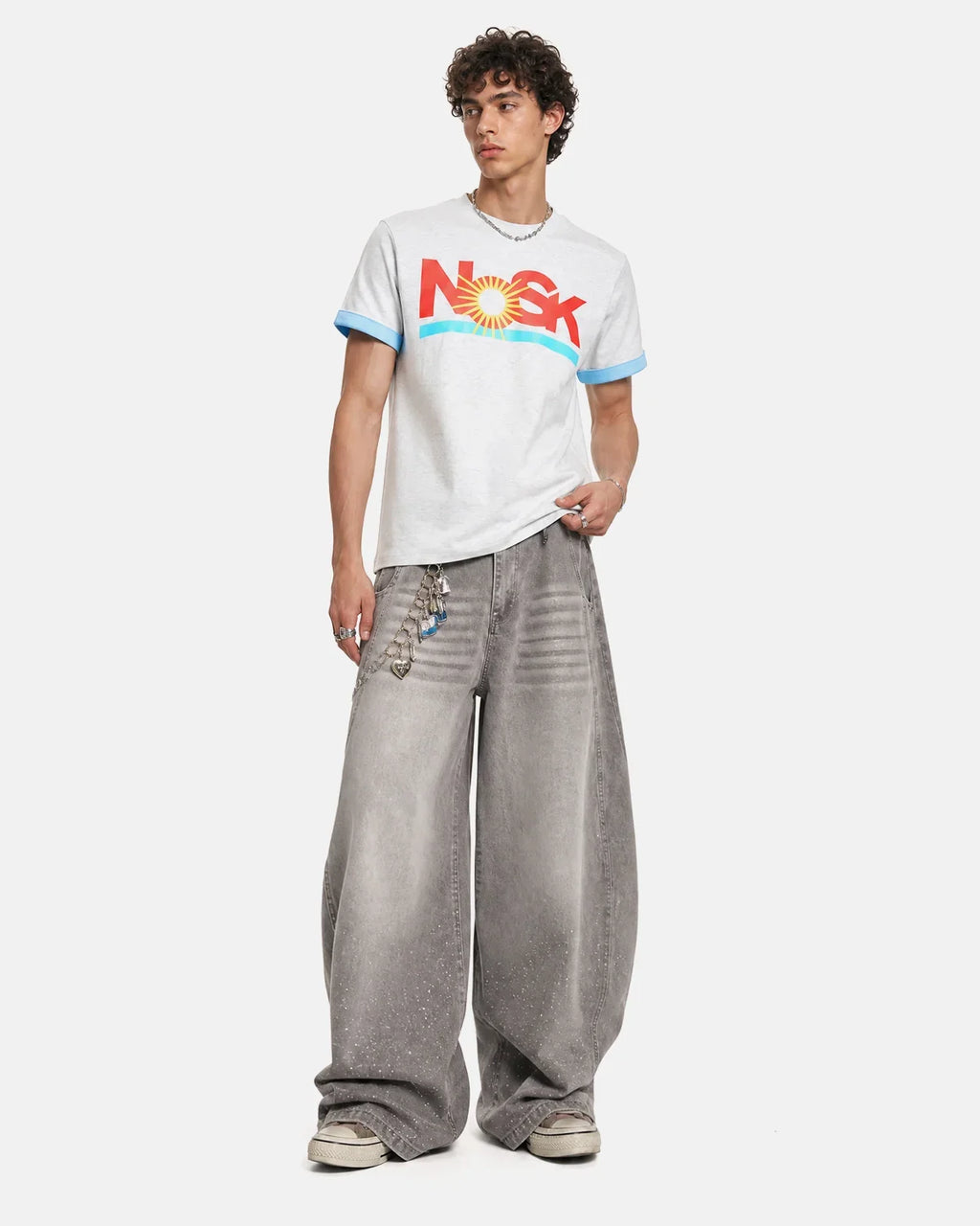Inflation Streetwear graphic layered T-shirt featuring bold design and layered fabric, casual streetwear style, men's fashion.