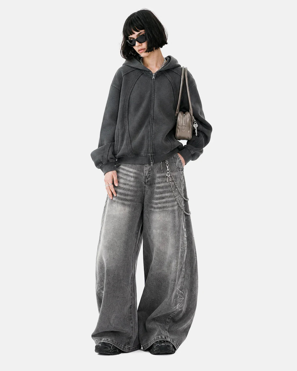 Inflation Streetwear Snow Washed Raw Edge Boxy Zip Up Hoodie displayed on a model, featuring a relaxed fit and raw hem detail.