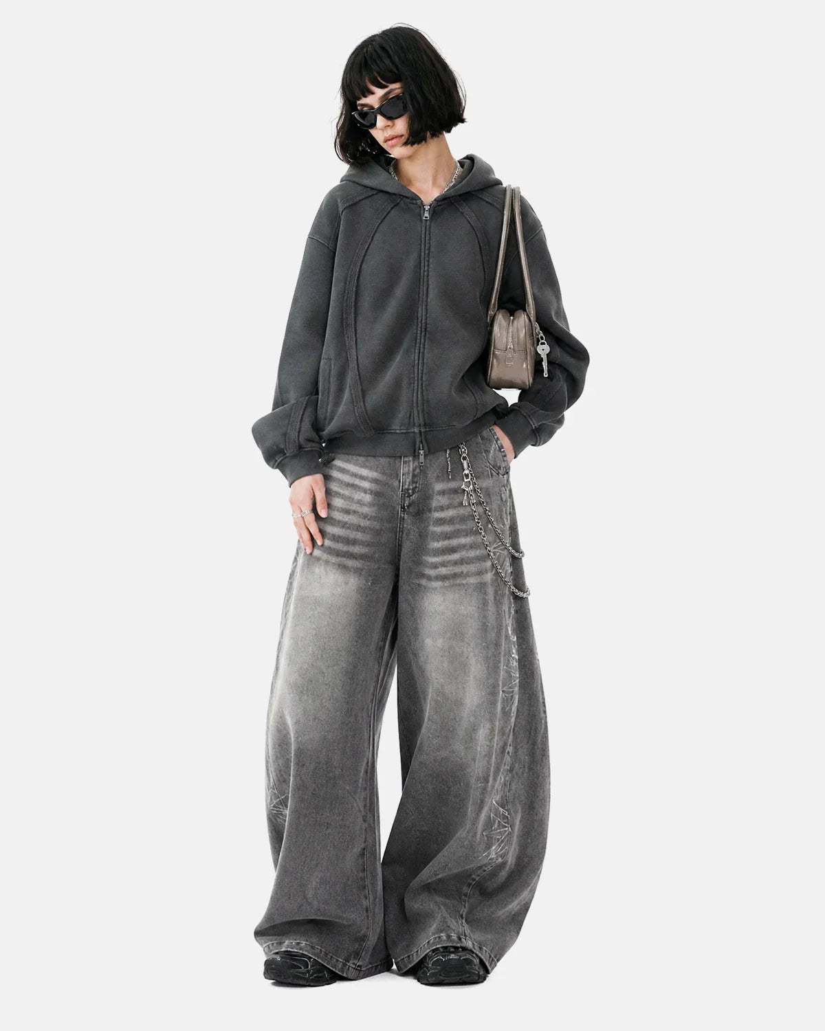 Inflation Streetwear Snow Washed Raw Edge Boxy Zip Up Hoodie displayed on a model, featuring a relaxed fit and raw hem detail.