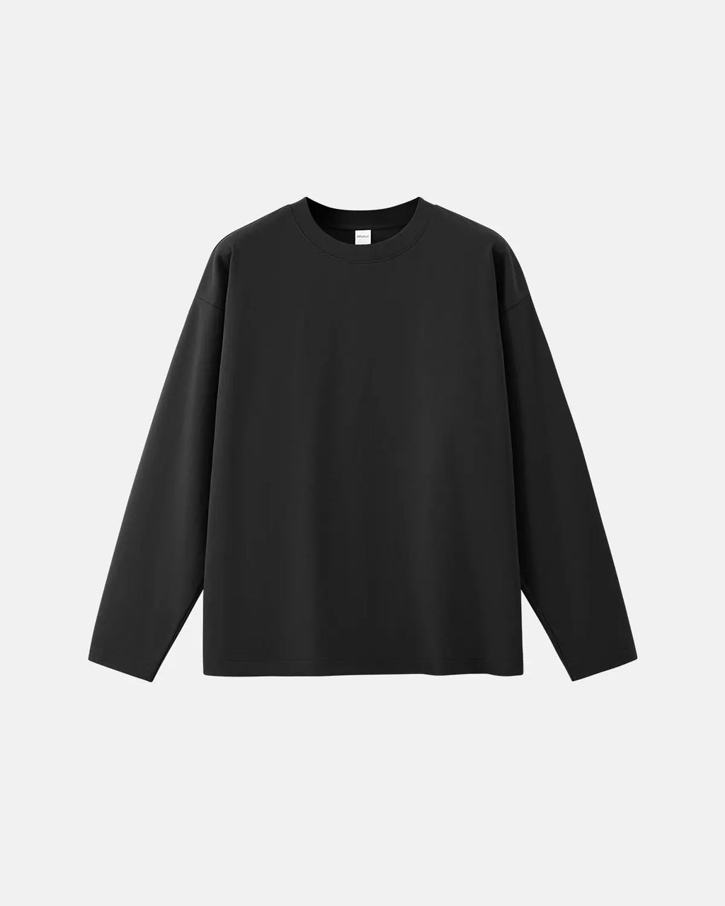 Plain white cotton long sleeve tee from INFLATION Streetwear, featuring a simple, classic crew neck and long sleeves.