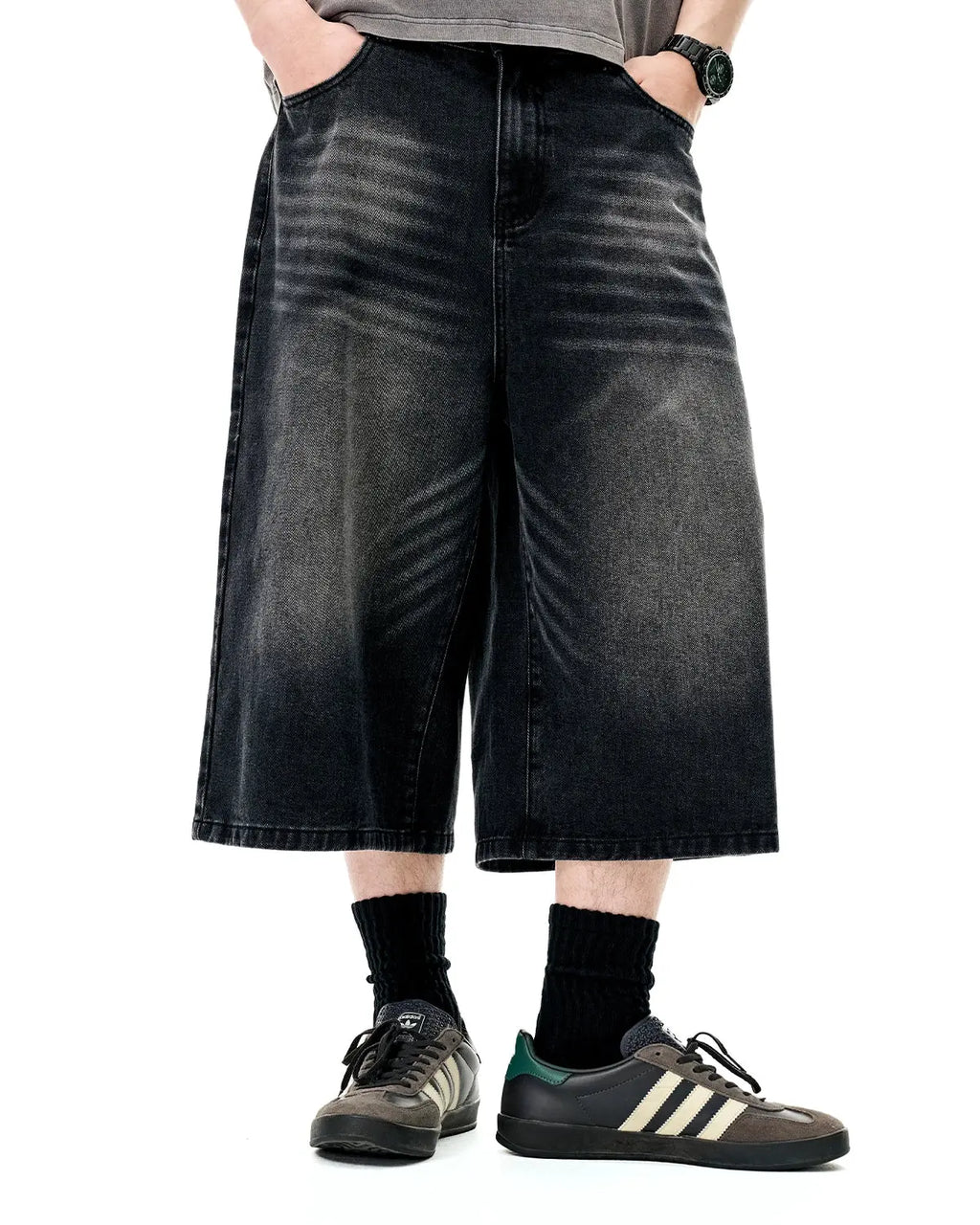 Washed baggy longline jorts by Flation Streetwear, loose-fit denim pants with distressed wash and relaxed style, front view.