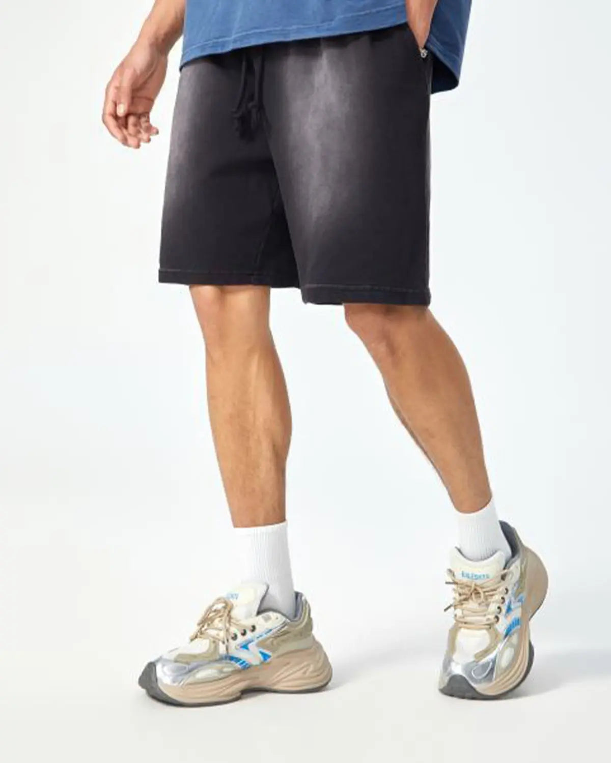 Monkey Washed Sweat Shorts by INFLATION, casual streetwear pants featuring a relaxed fit and washed fabric texture.
