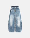 Acid washed Whisker Clasp Barrel Jeans by INFLATION Streetwear, showing distressed denim with unique barrel fit and whisker details.