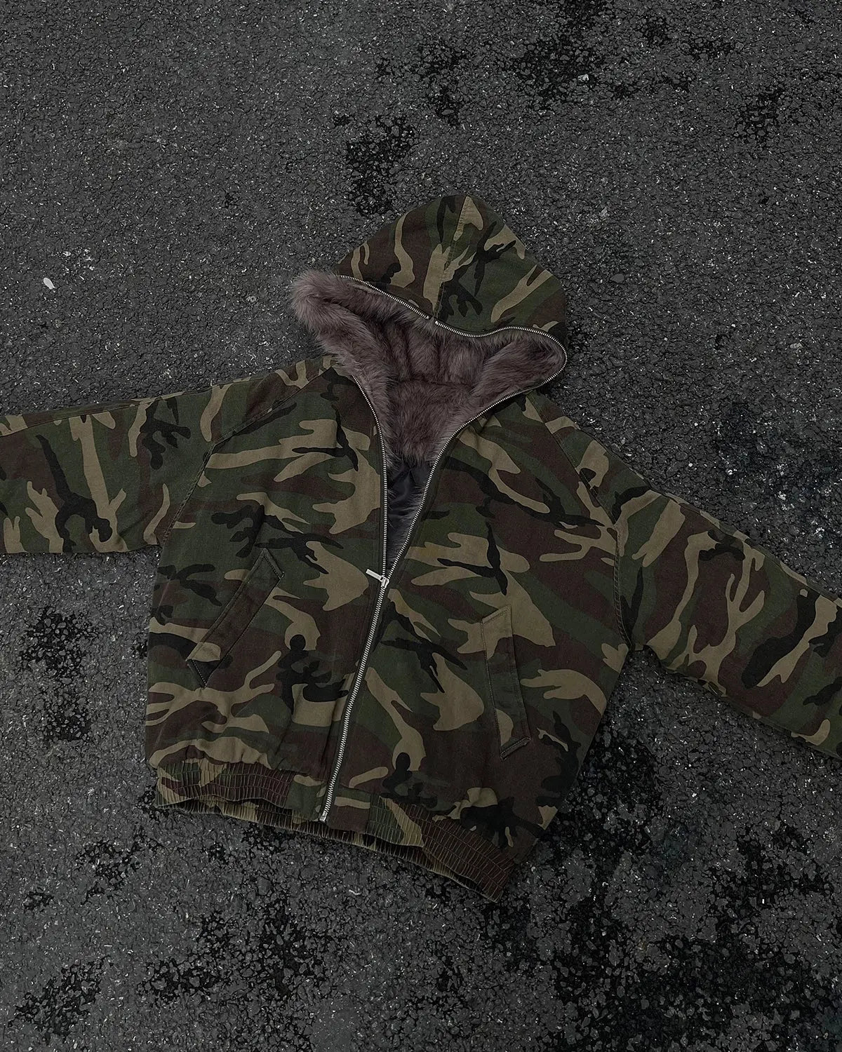 Inflation Camo Faux Fur Lined Bomber Jacket with camouflage pattern and cozy fur interior, stylish streetwear outerwear.