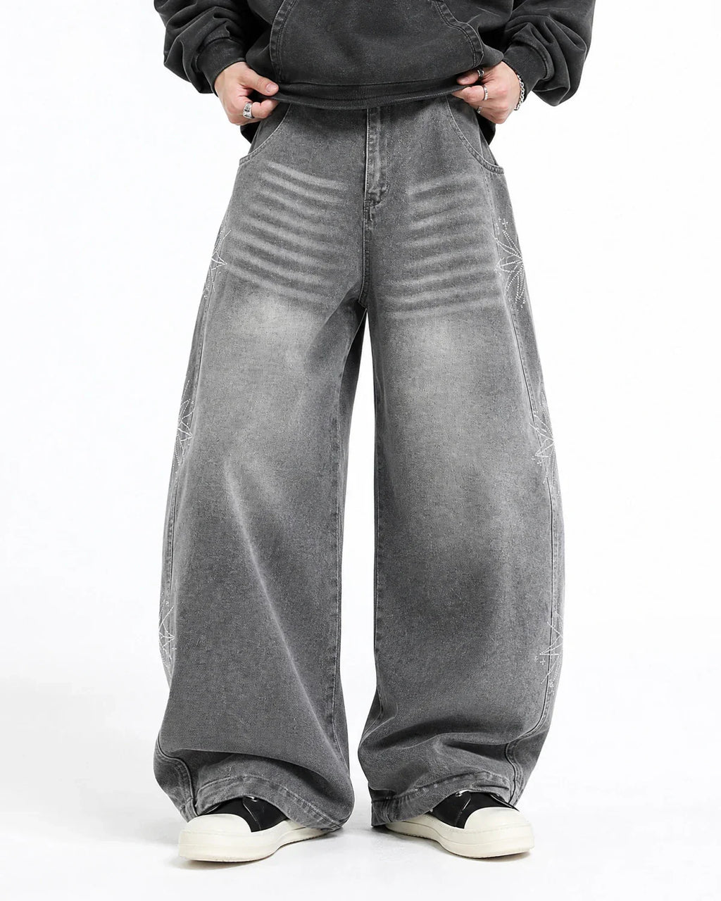 Flation streetwear star graphic rhinestone barrel baggy jeans showing the embellished star design and relaxed fit detail.