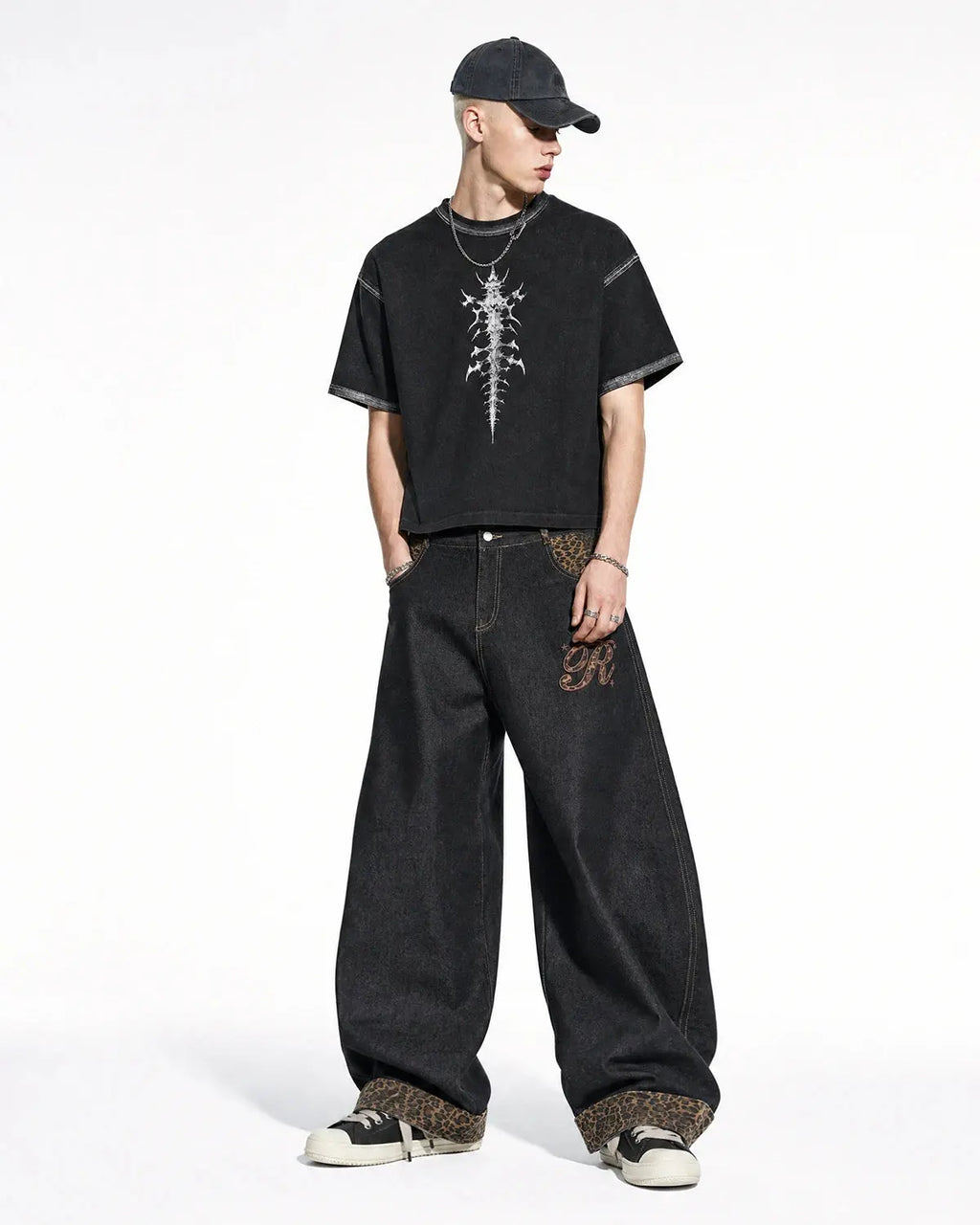 Leopard patchwork embroidery baggy jeans by INFLATION, featuring distressed details and relaxed streetwear style.