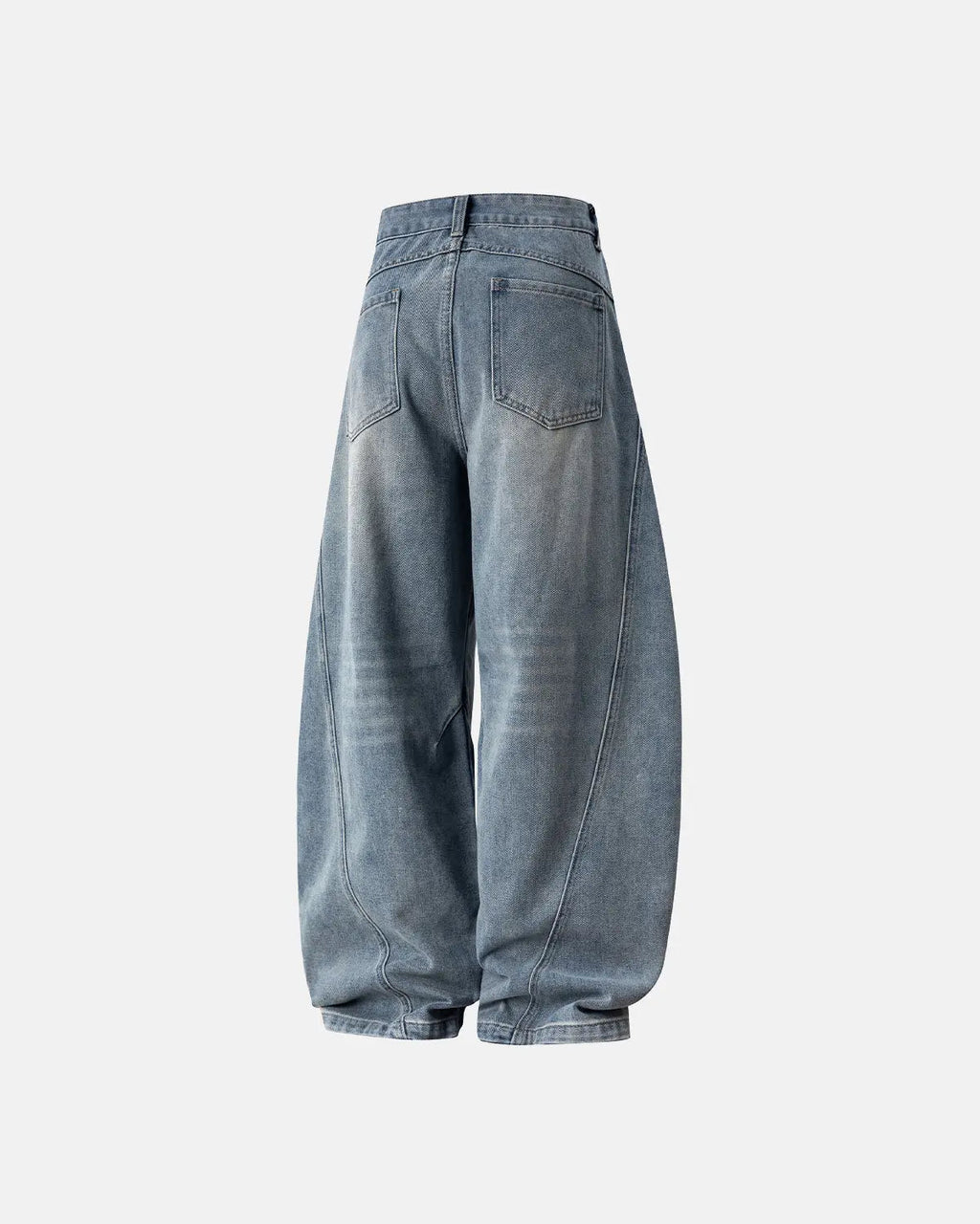 Curved seam deconstructed barrel jeans by Inflation Streetwear, showing distressed denim with a unique curved seam design.