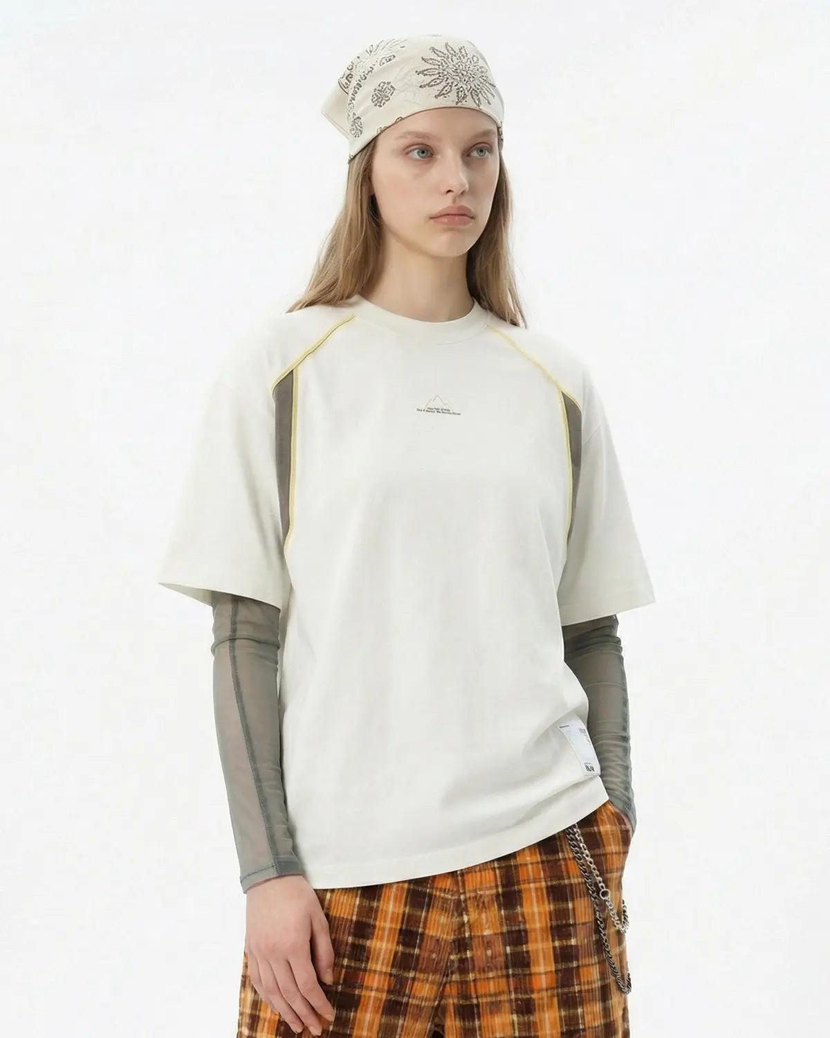 Inflation Streetwear glow-in-the-dark oversized T-shirt with visible stitching, featuring a relaxed fit and bold design details.