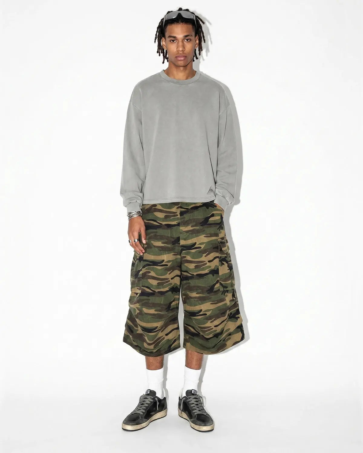 Inflation Camo Cargo Baggy Shorts with multiple pockets, relaxed fit, and camouflage print, perfect for streetwear style.