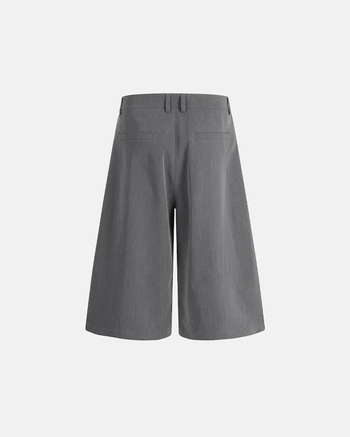 Inflation Streetwear pleated tailored shorts with stud details, featuring a stylish fit and structured design, perfect for street fashion.