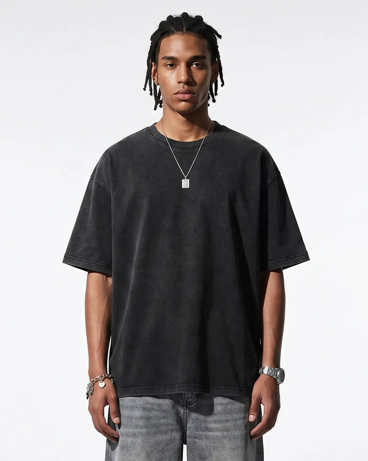 Oversized heavyweight washed T-shirt by Flation Streetwear, showing relaxed fit, soft fabric, and faded washed finish in natural light.
