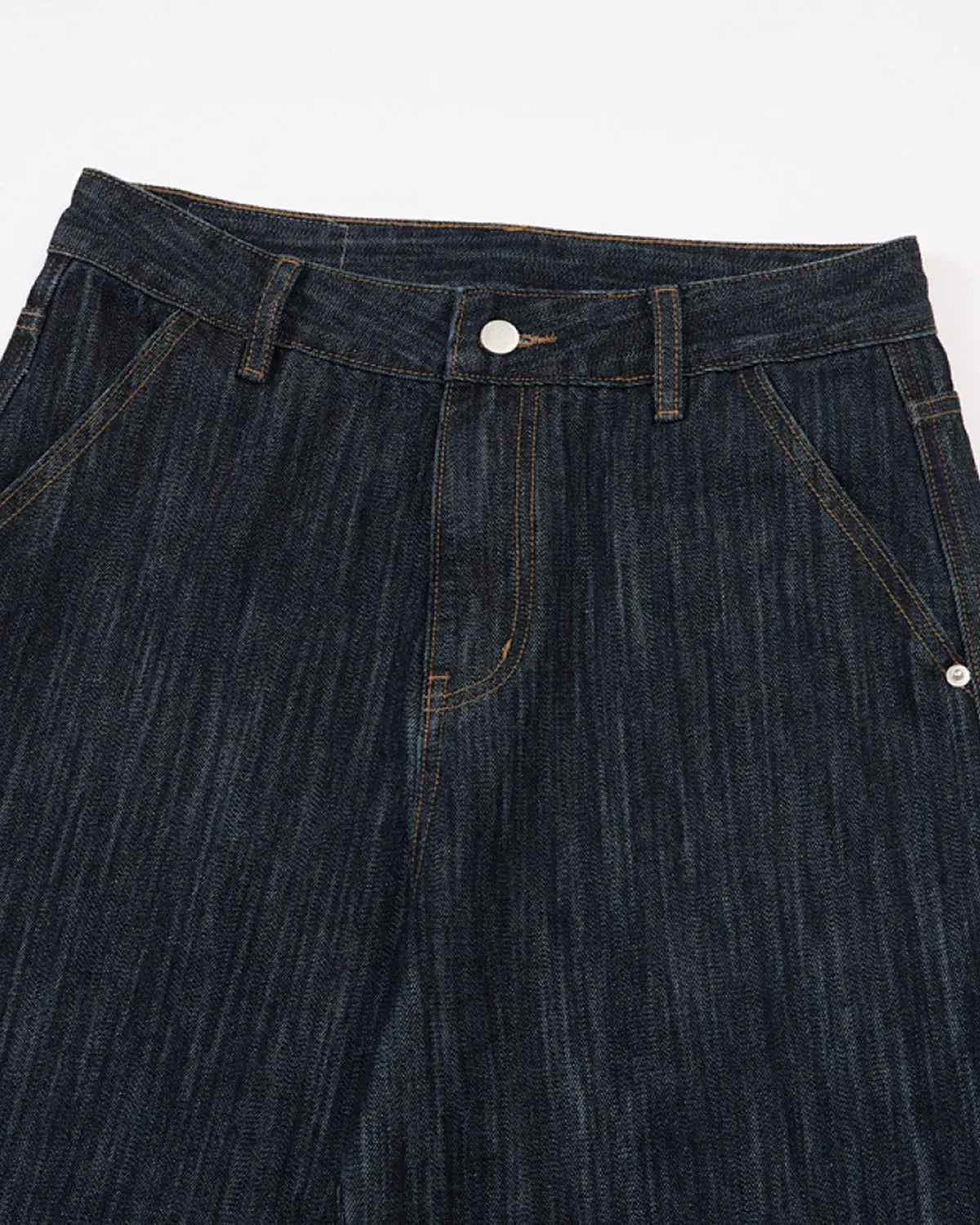 Dark indigo wide bootcut jeans by INFLATION, displayed flat with visible stitching and classic five-pocket design.
