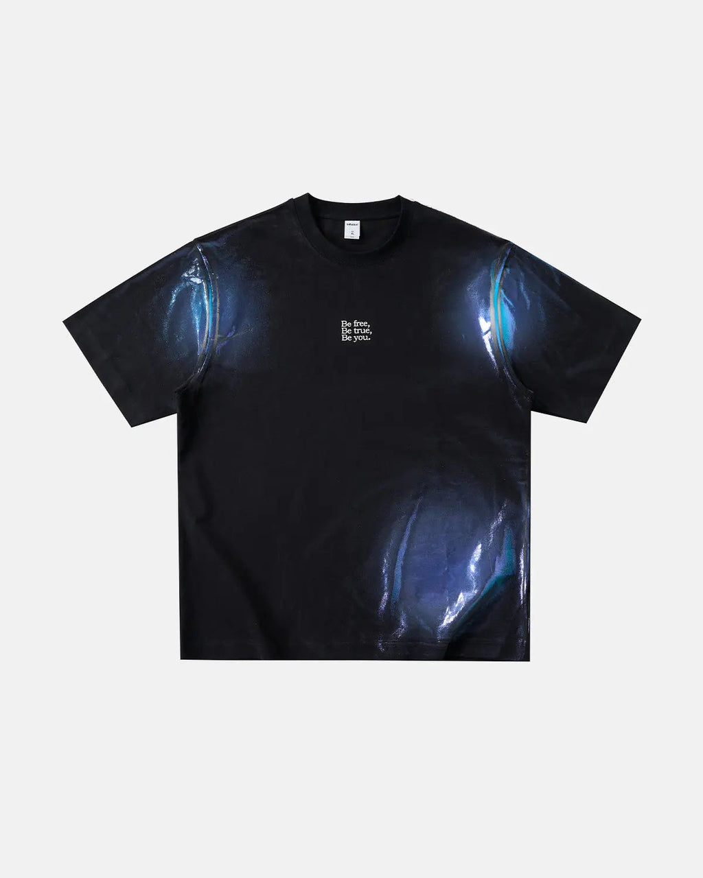 Iridescent shimmer oversized T-shirt by INFLATION, showing the reflective, colorful fabric and relaxed fit on a mannequin.
