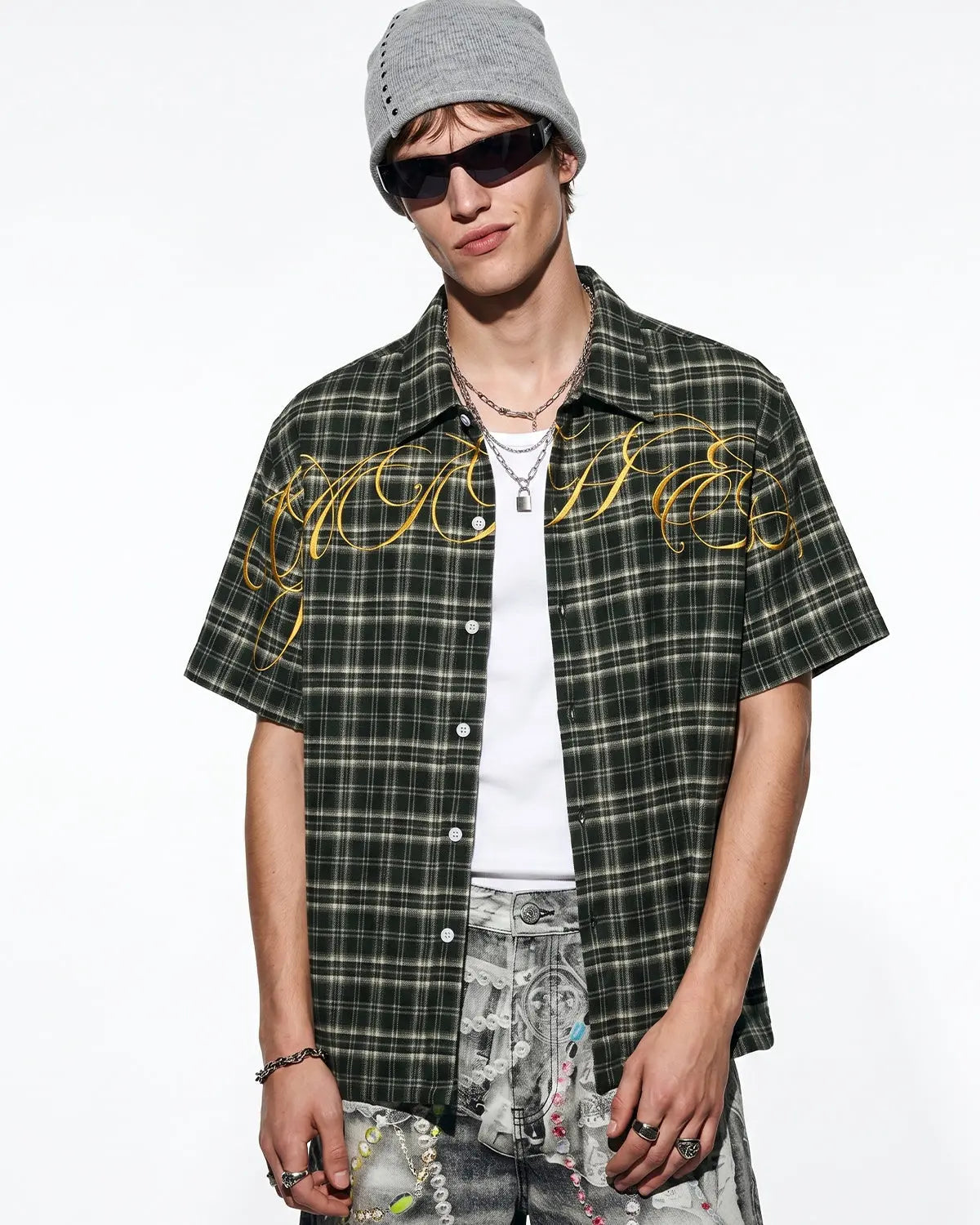Inflation Streetwear lettering embroidery plaid shirt featuring bold text and classic plaid pattern, casual streetwear style.