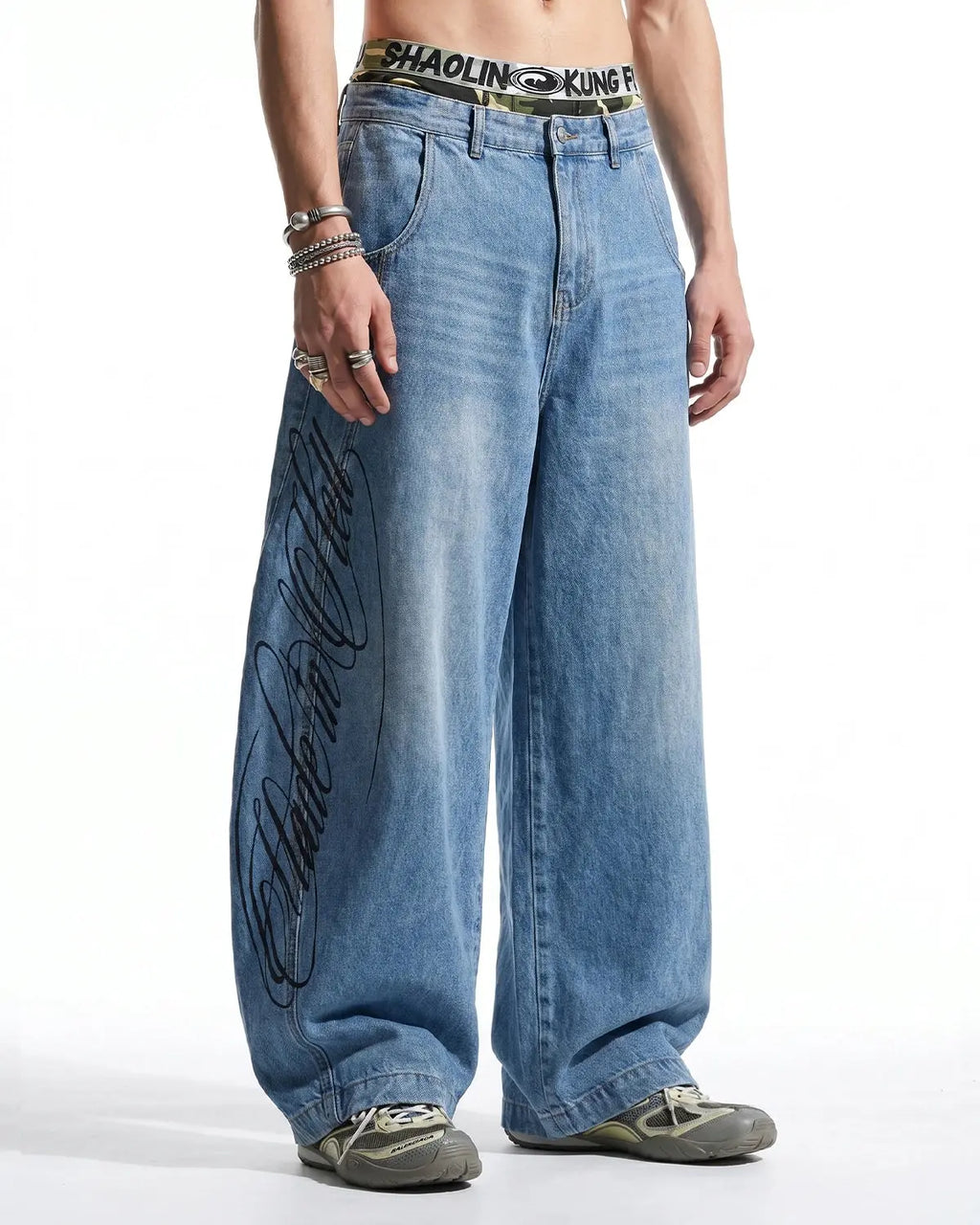 Inflation Streetwear Script Graphic Barrel Jeans, stylish pants with bold script design and relaxed fit, denim fabric, front and back views.