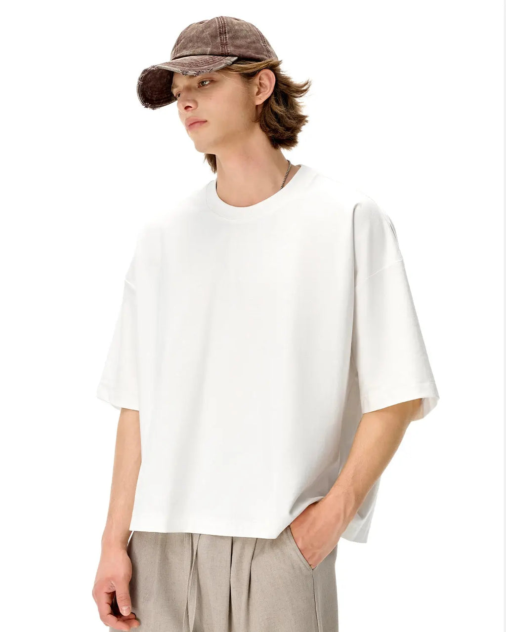 Oversized black boxy t-shirt by Flation Streetwear, featuring a relaxed fit and minimalist design, displayed flat on a white background.
