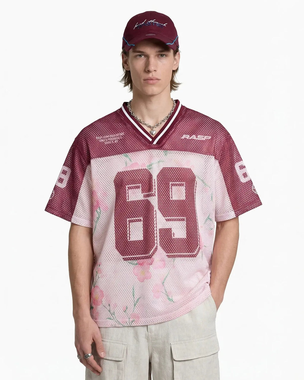 Inflation Floral Digital Print Mesh Jersey showcasing vibrant floral patterns and lightweight mesh fabric for streetwear style.