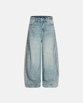Acid wash striped side baggy jeans by INFLATION, featuring relaxed fit, distressed details, and bold striped design for streetwear style.