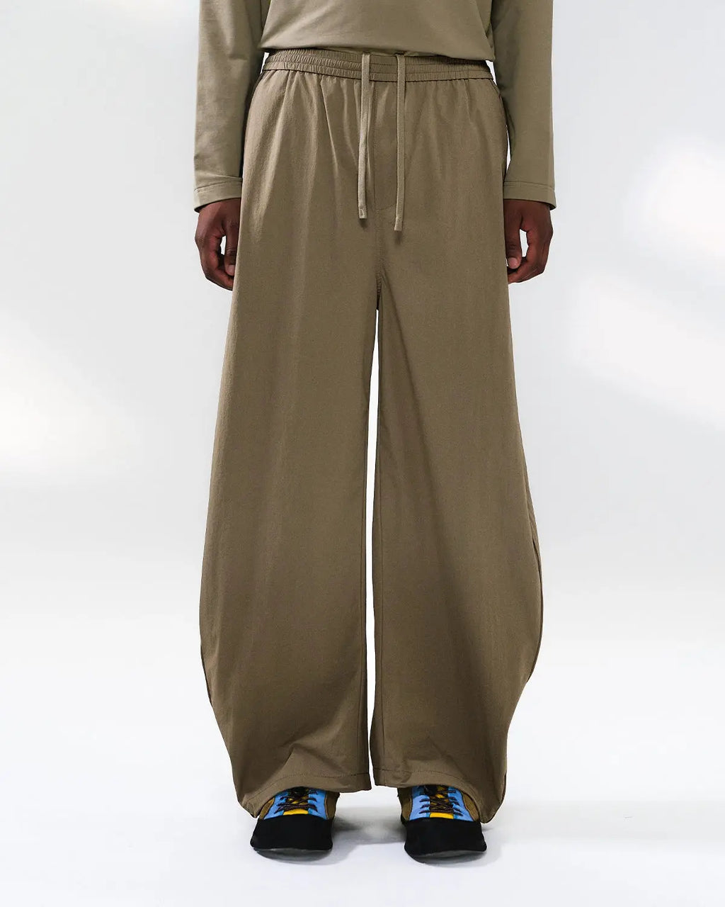 Inflation outdoor quick dry track pants in black, featuring sleek design and athletic fit for active wear and outdoor activities.