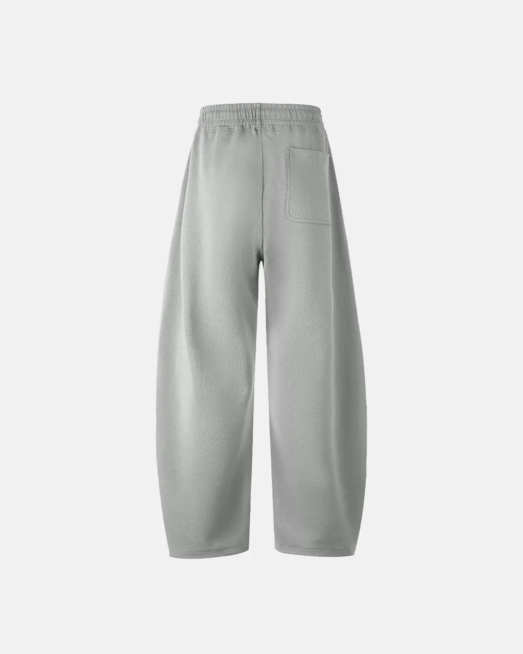 Inflation grey baggy sweatpants with relaxed fit and elastic waistband, casual loungewear style, shown on a model.