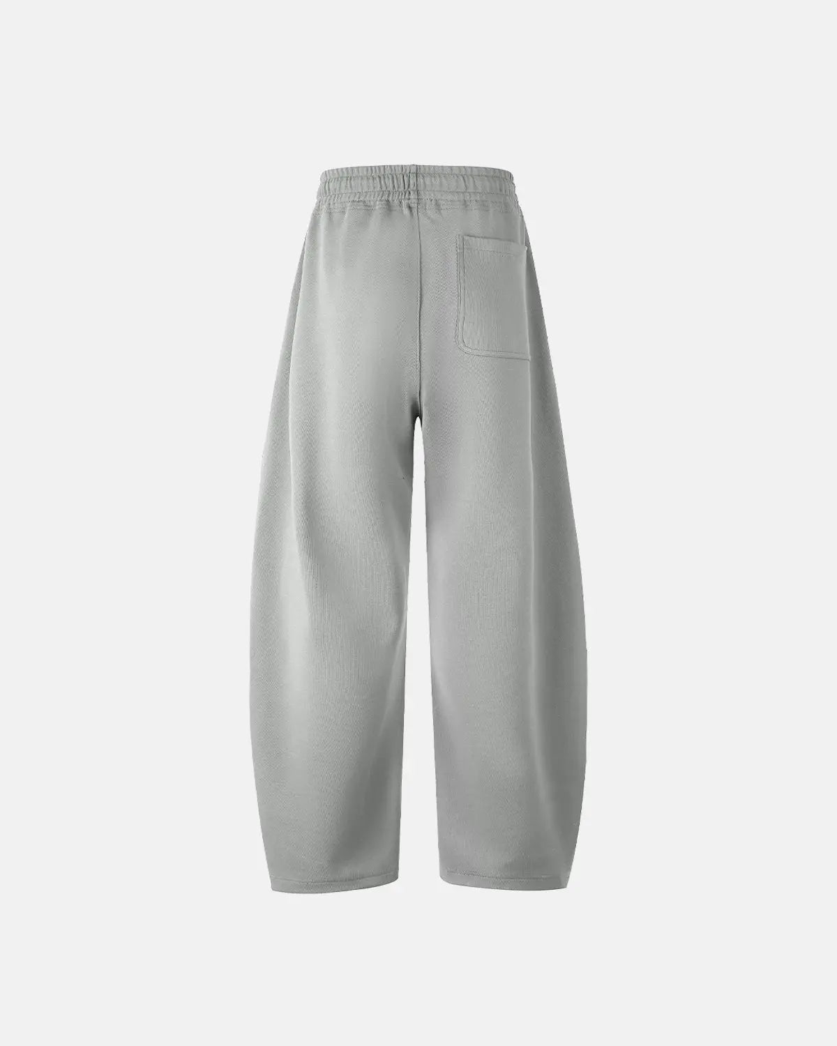 Inflation grey baggy sweatpants with relaxed fit and elastic waistband, casual loungewear style, shown on a model.
