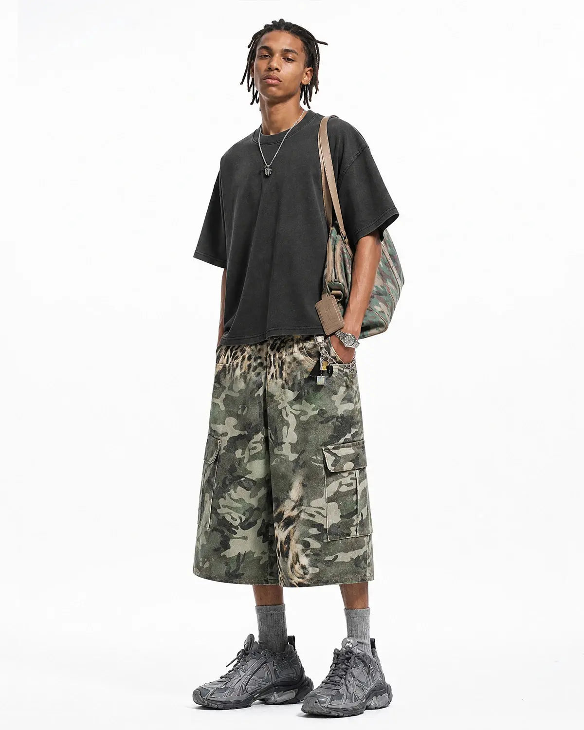 Leopard camo cargo longline shorts from INFLATION Streetwear featuring bold camo pattern and extended length style.